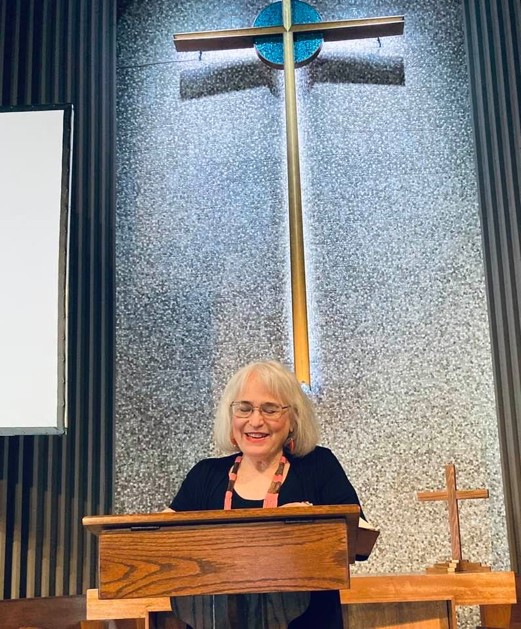 Jill preaching at Knox